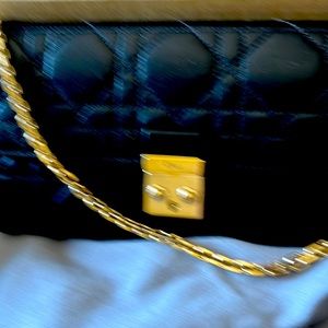 I am reposhing this beautiful Christian Dior wallet on a chain.